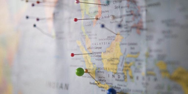 World map with pins